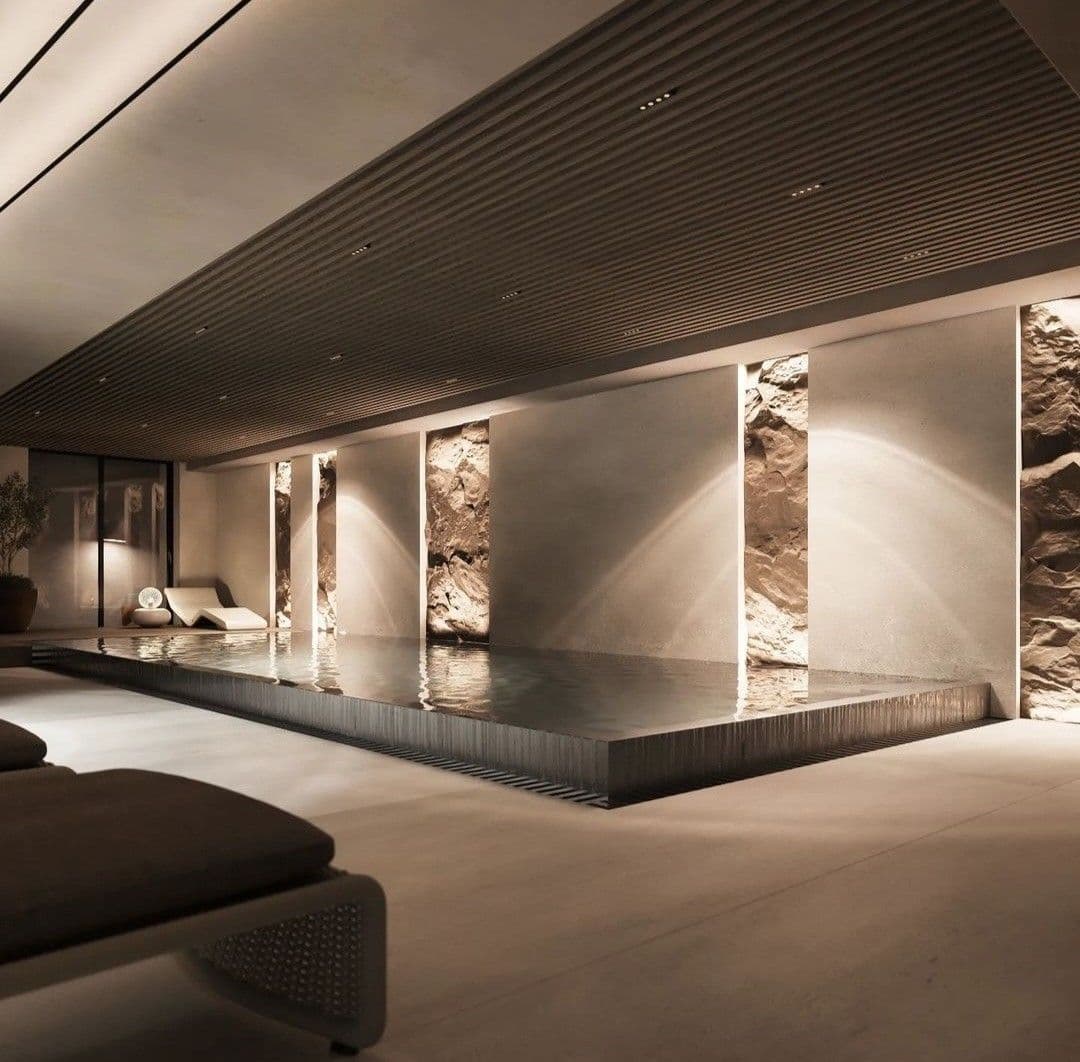 Luxury spa treatment room with marble and candlelight Malta hotel — search: luxury spa treatment room marble candles 5 star hotel